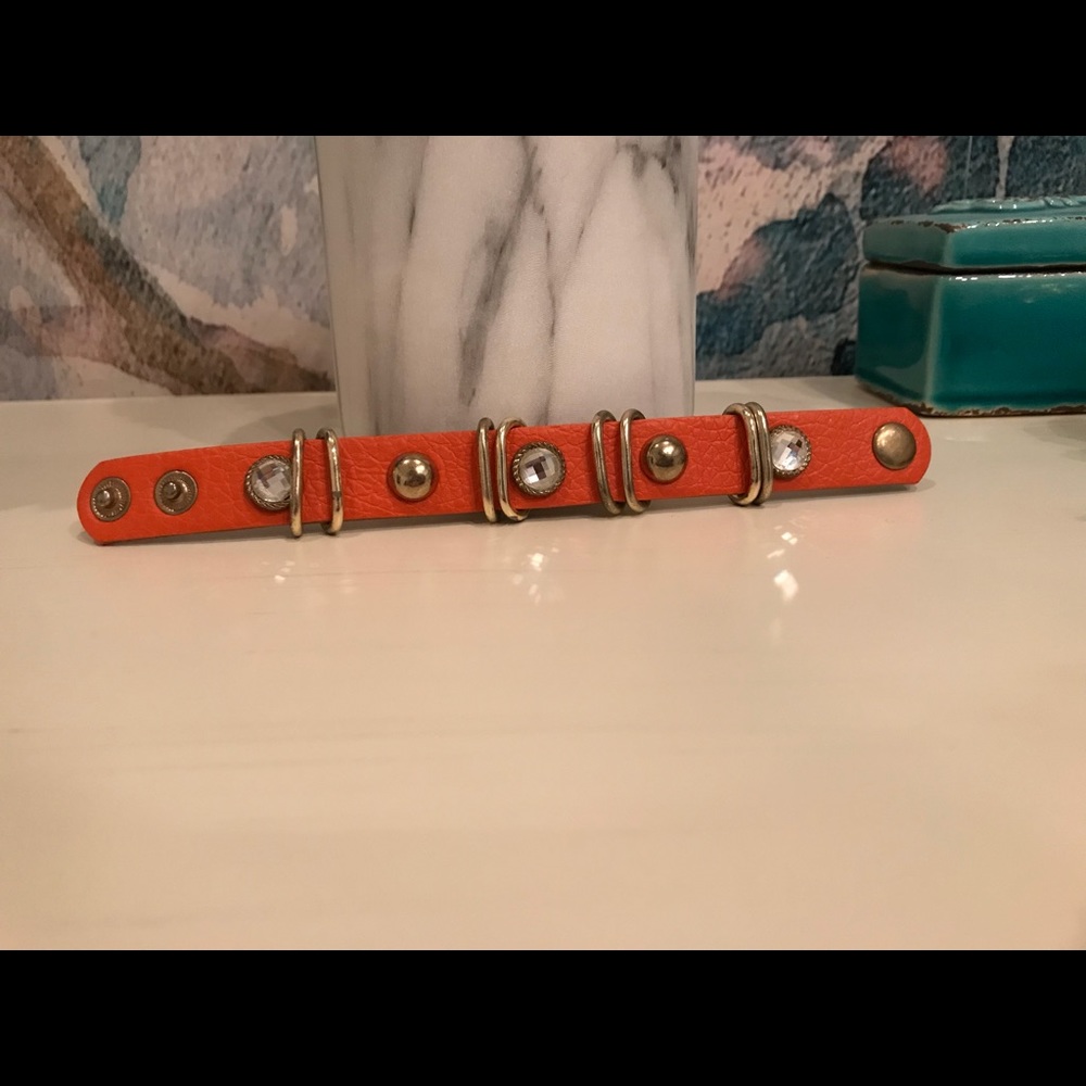 Orange bedazzled bracelet